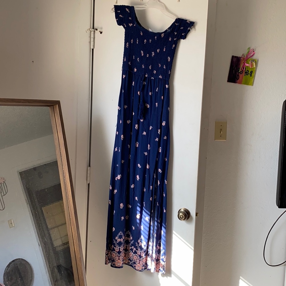 Off the shoulder navy blue dress with pink flowers.